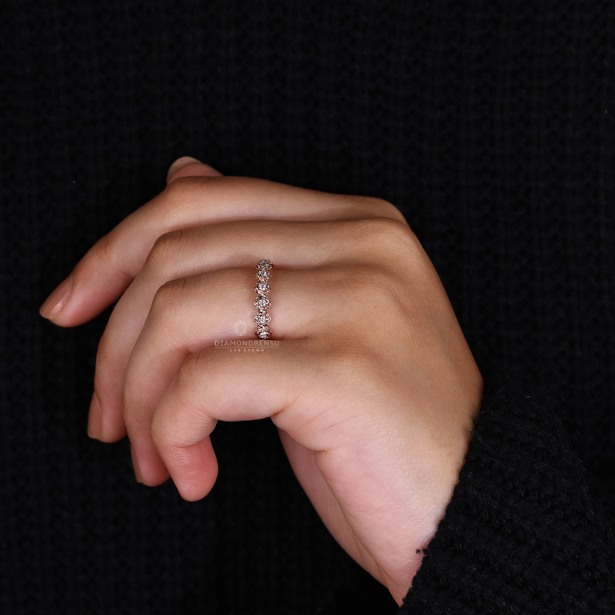 Rose gold wedding band with eternity design
