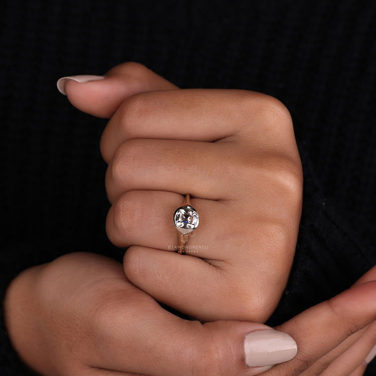 Custom engagement ring with tapered shank ring.
