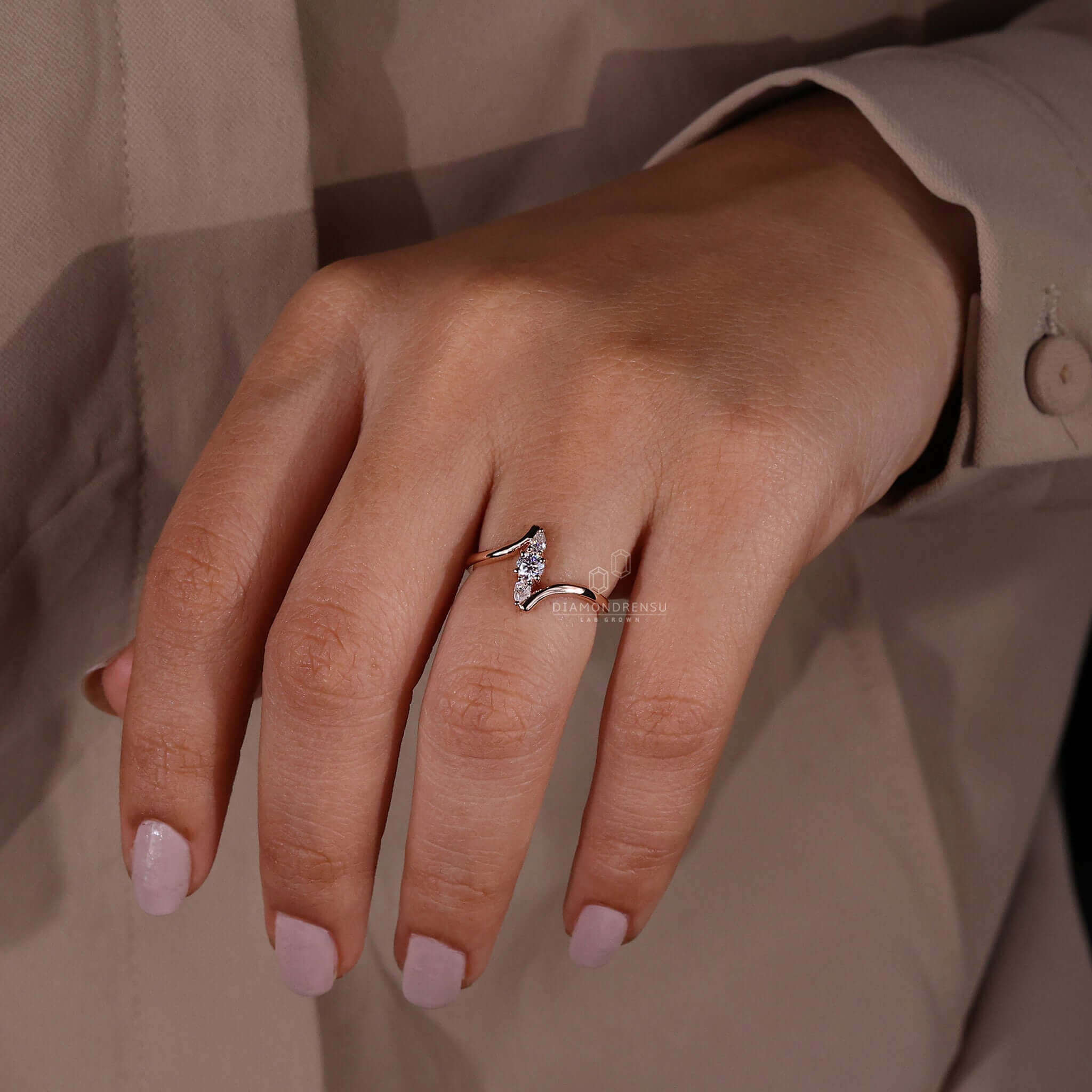 Round cut diamond ring paired with a rose gold wedding ring for unmatched brilliance.