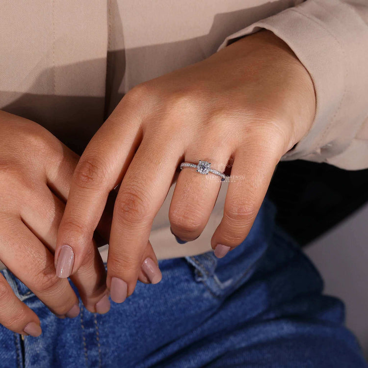Round cut diamond ring crafted with a halo engagement ring design for women seeking elegance.
