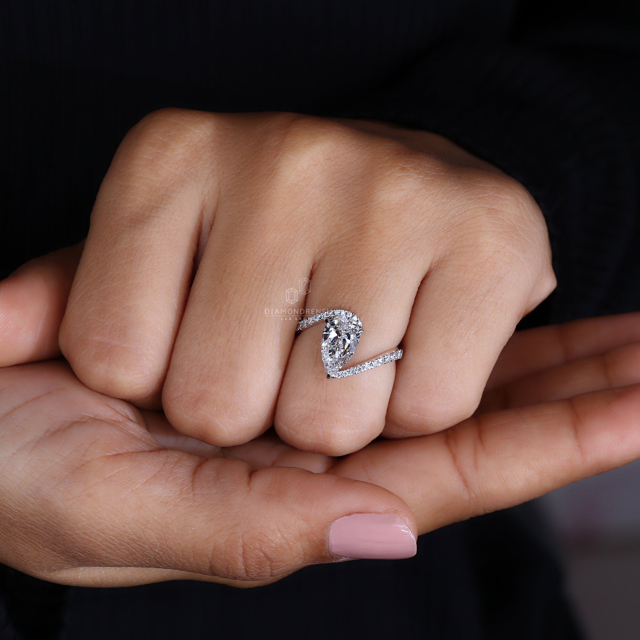 Custom engagement ring with 3 claw prong setting.
