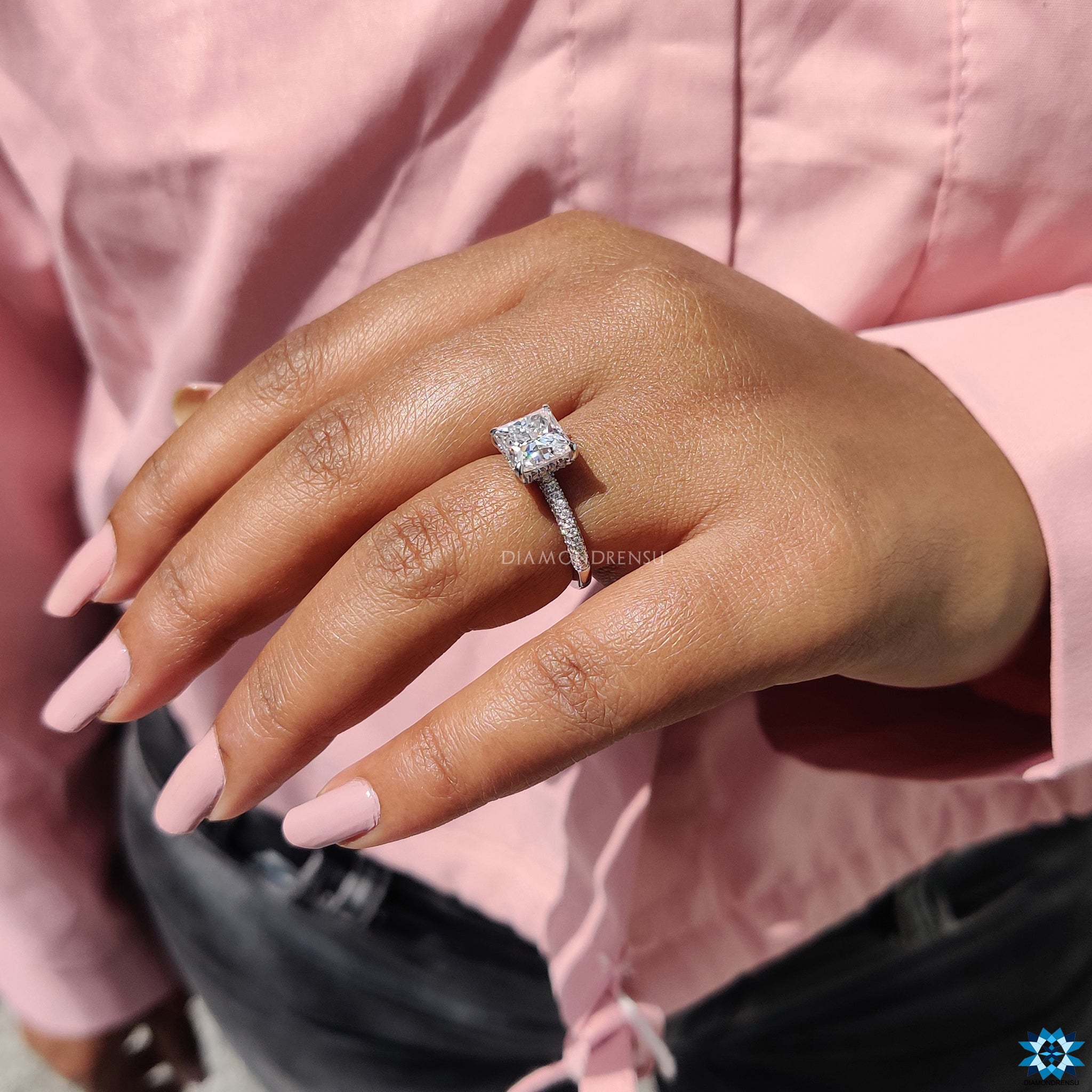 Buy moissanite ring with 3 sided pave and hidden accent design.
