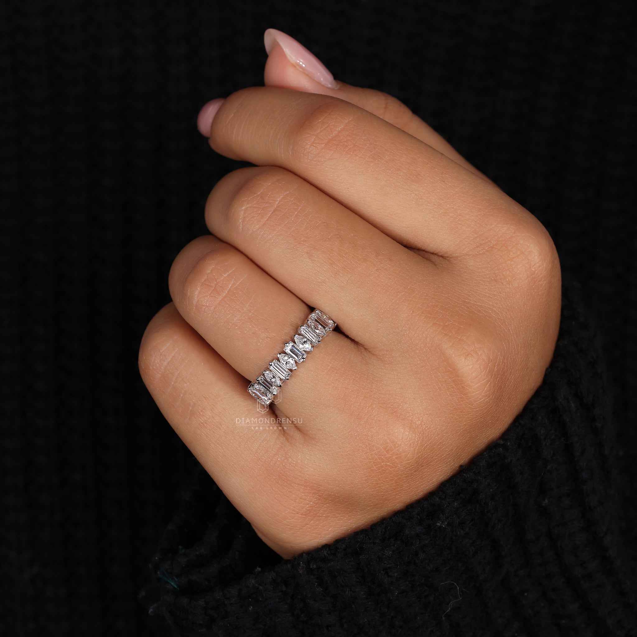 Eternity band in white gold with unique diamond cuts.
