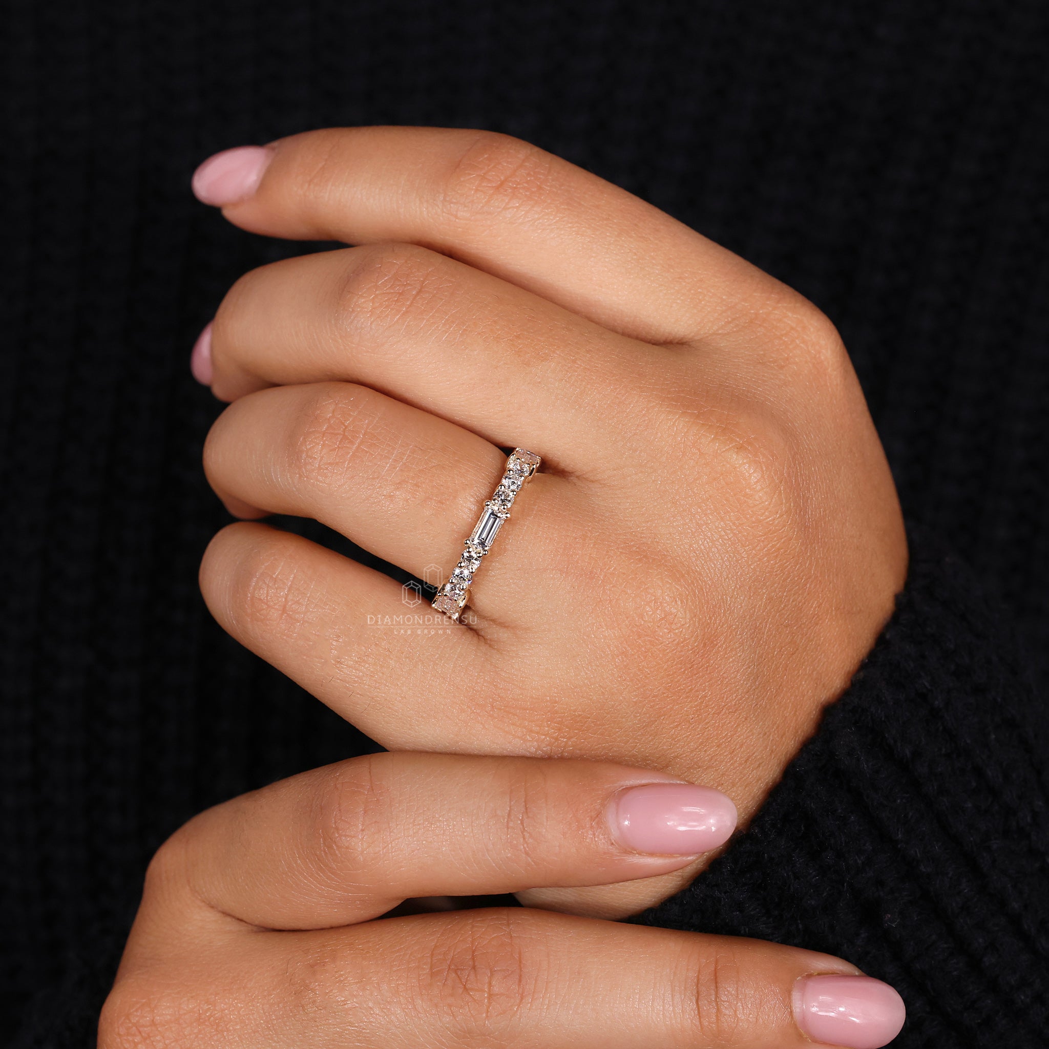 Yellow gold wedding band with baguette design
