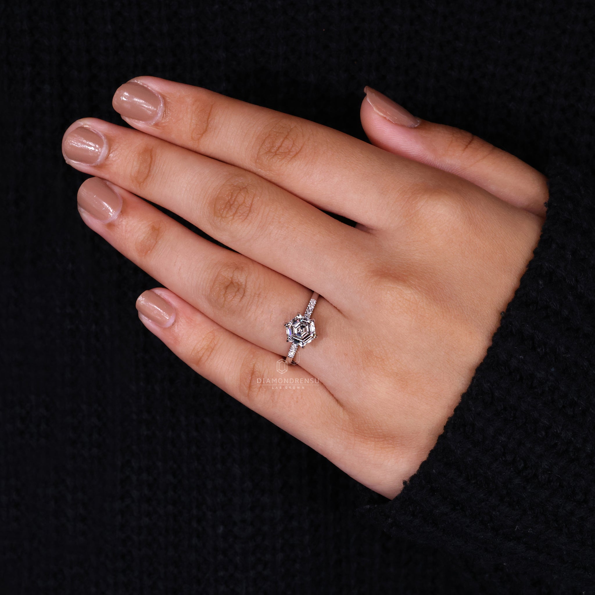 UK engagement ring crafted with pave setting ring style.
