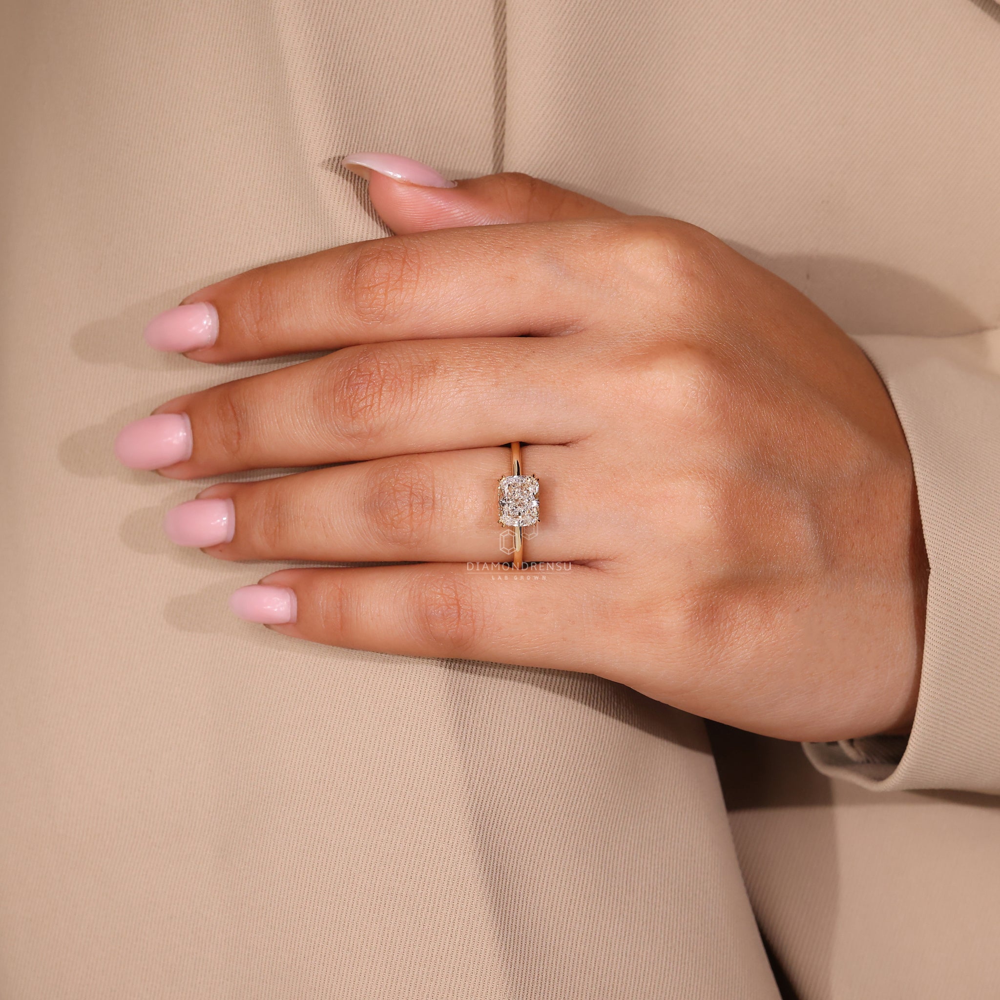 Diamondrensu UK ring featuring solitaire diamond and custom design.
