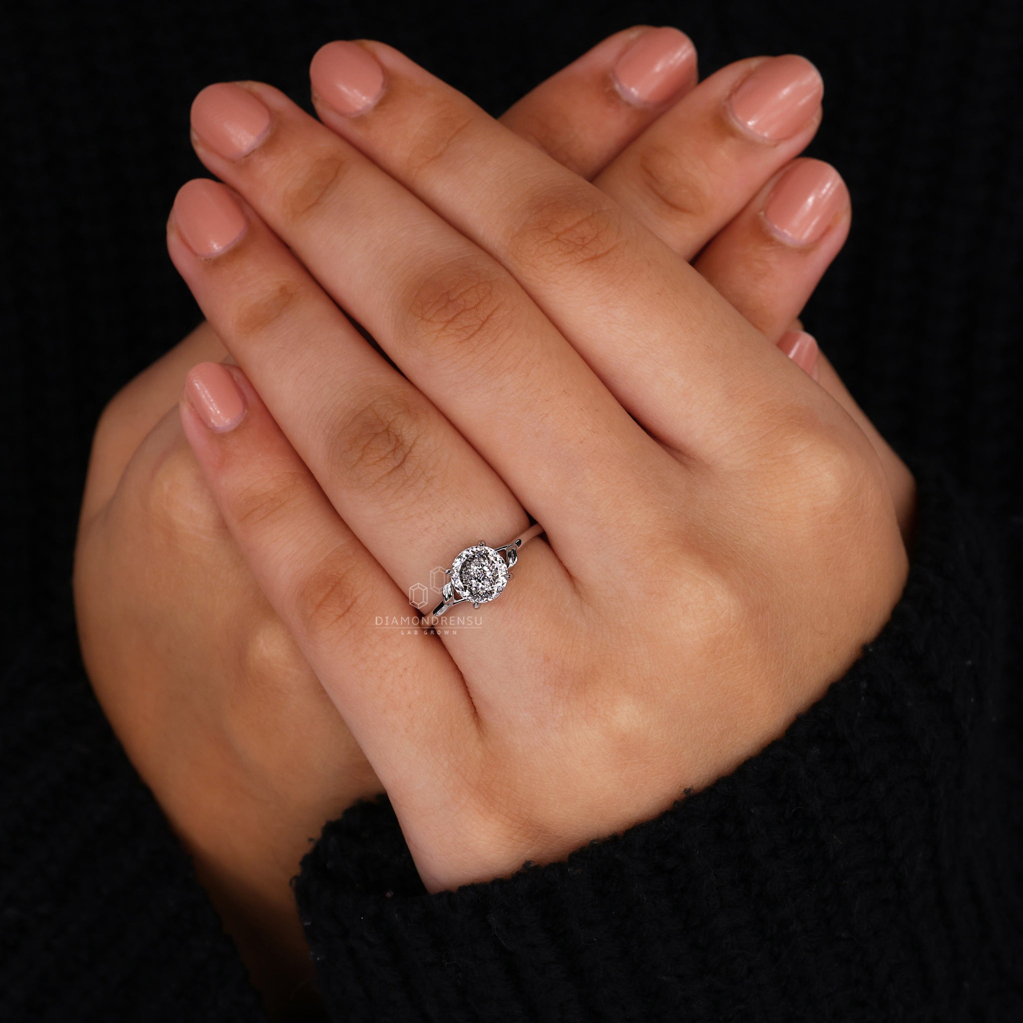 White gold ring featuring 4 prong setting.
