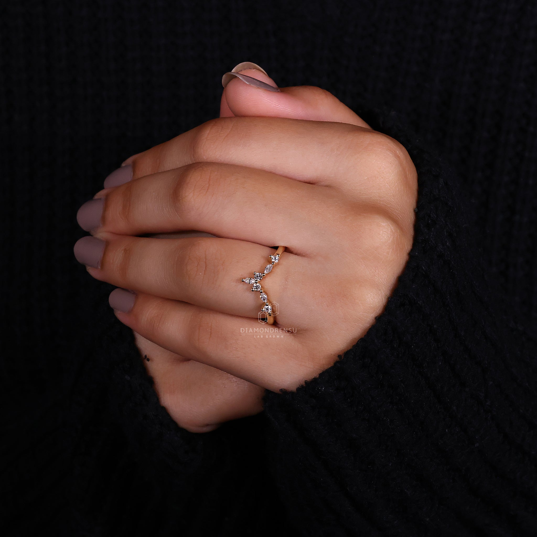 Marquise outline diamond crown wedding ring.
