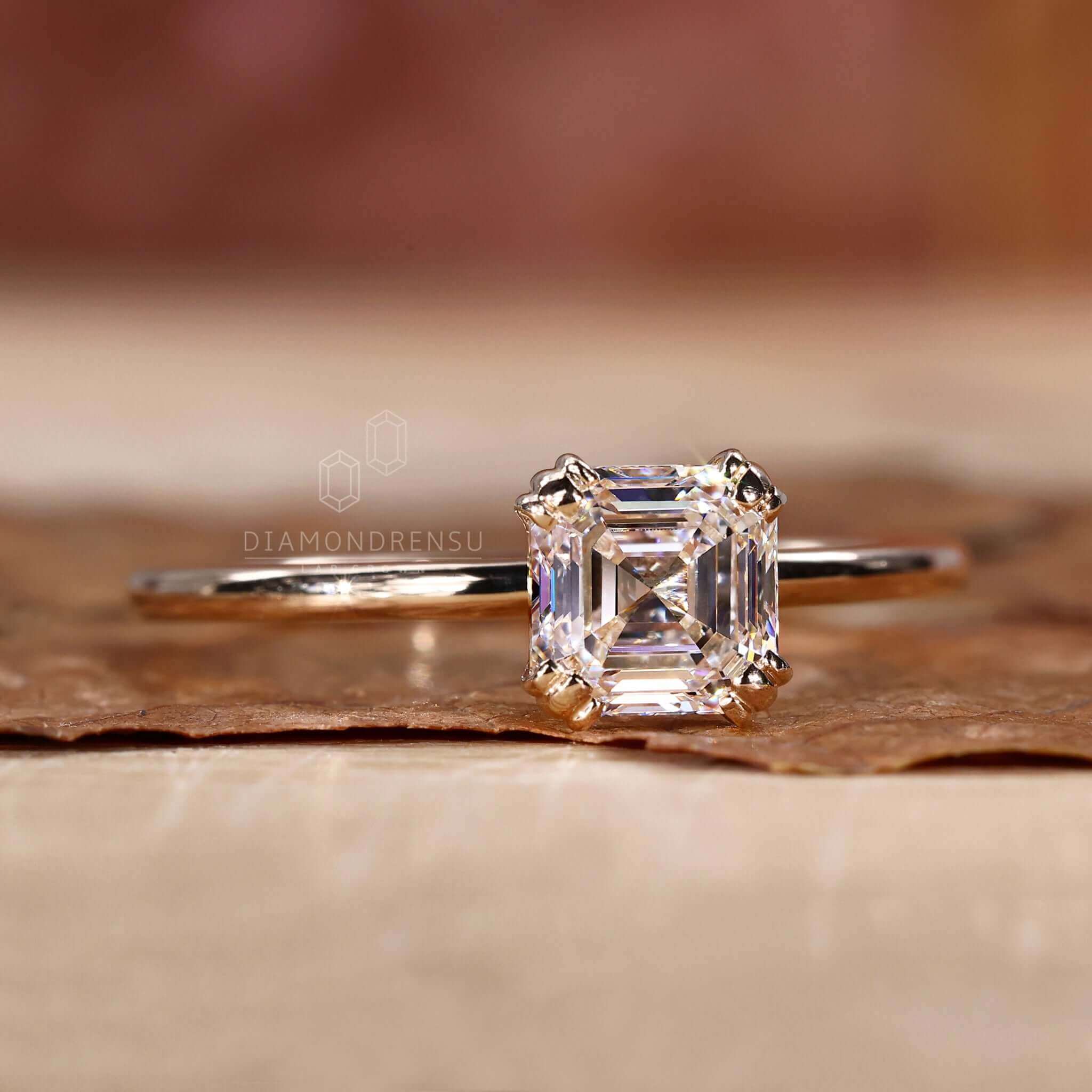 Gold Solitaire Diamond Ring with a fishtail prong setting for durability.