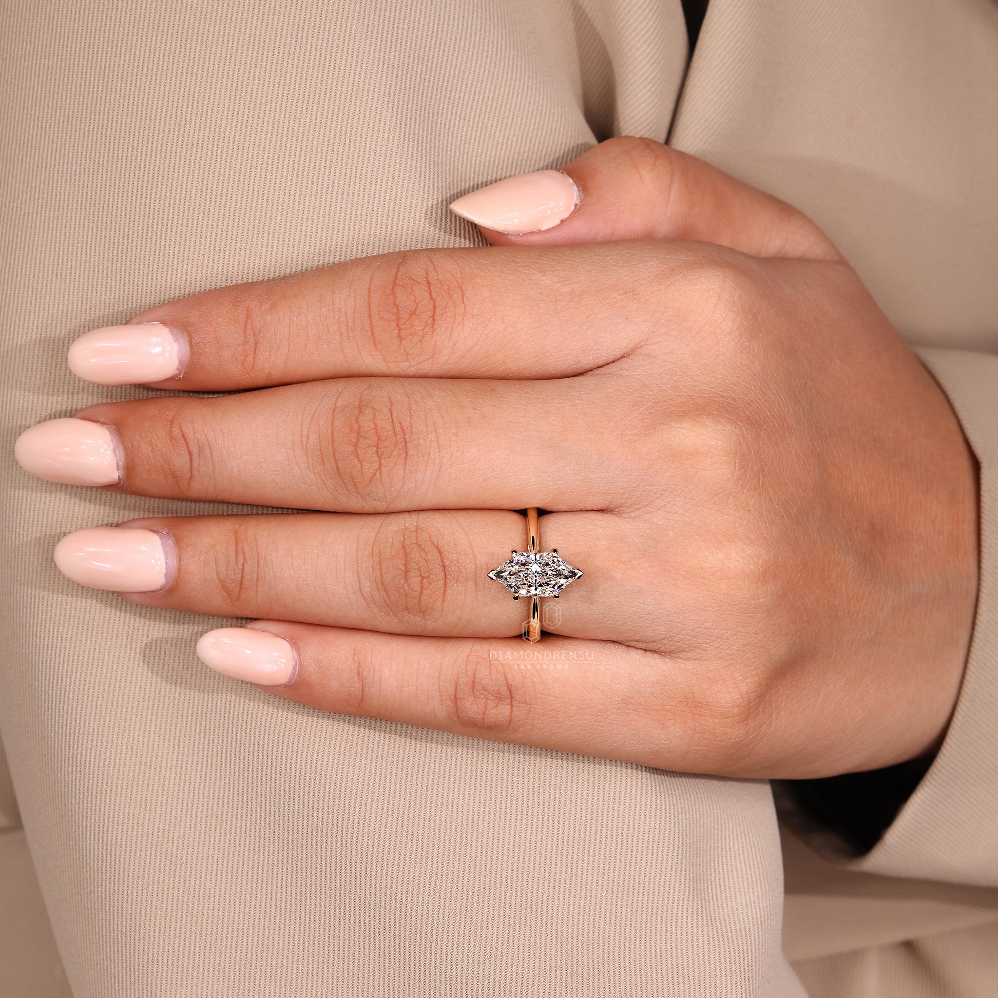 Hidden halo engagement ring for added brilliance.
