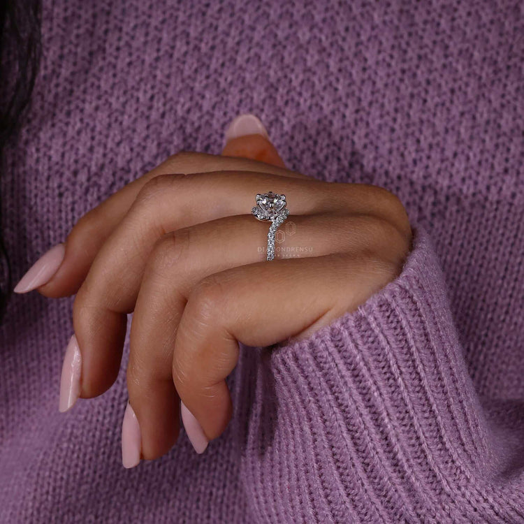Round engagement ring with pave diamonds and a white gold engagement ring setting for added charm.