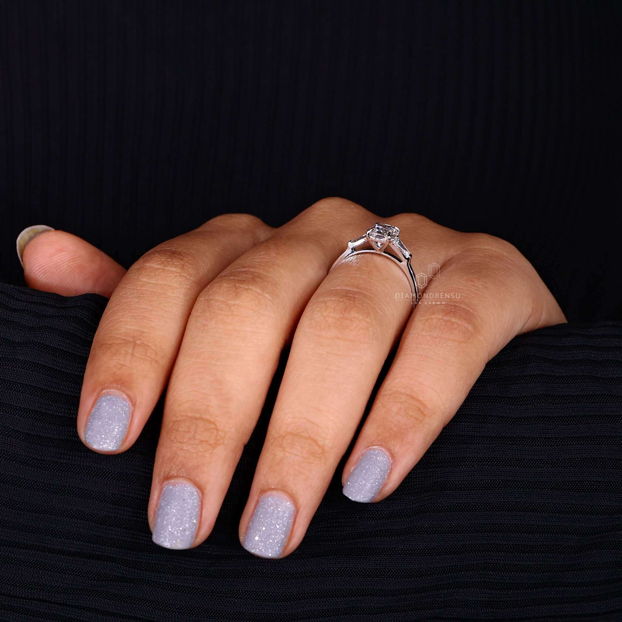 Baguette ring paired with radiant cut diamonds for elegance.