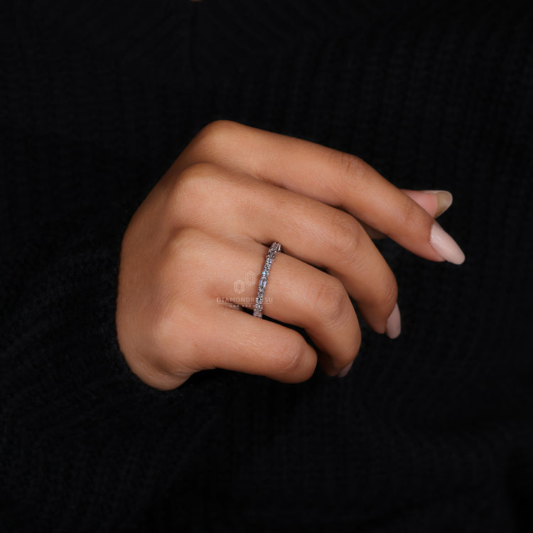 Half eternity white gold wedding band with diamonds.
