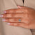 4 claw prong ring holding the diamond securely.
