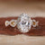 Halo diamond engagement ring in yellow gold.
