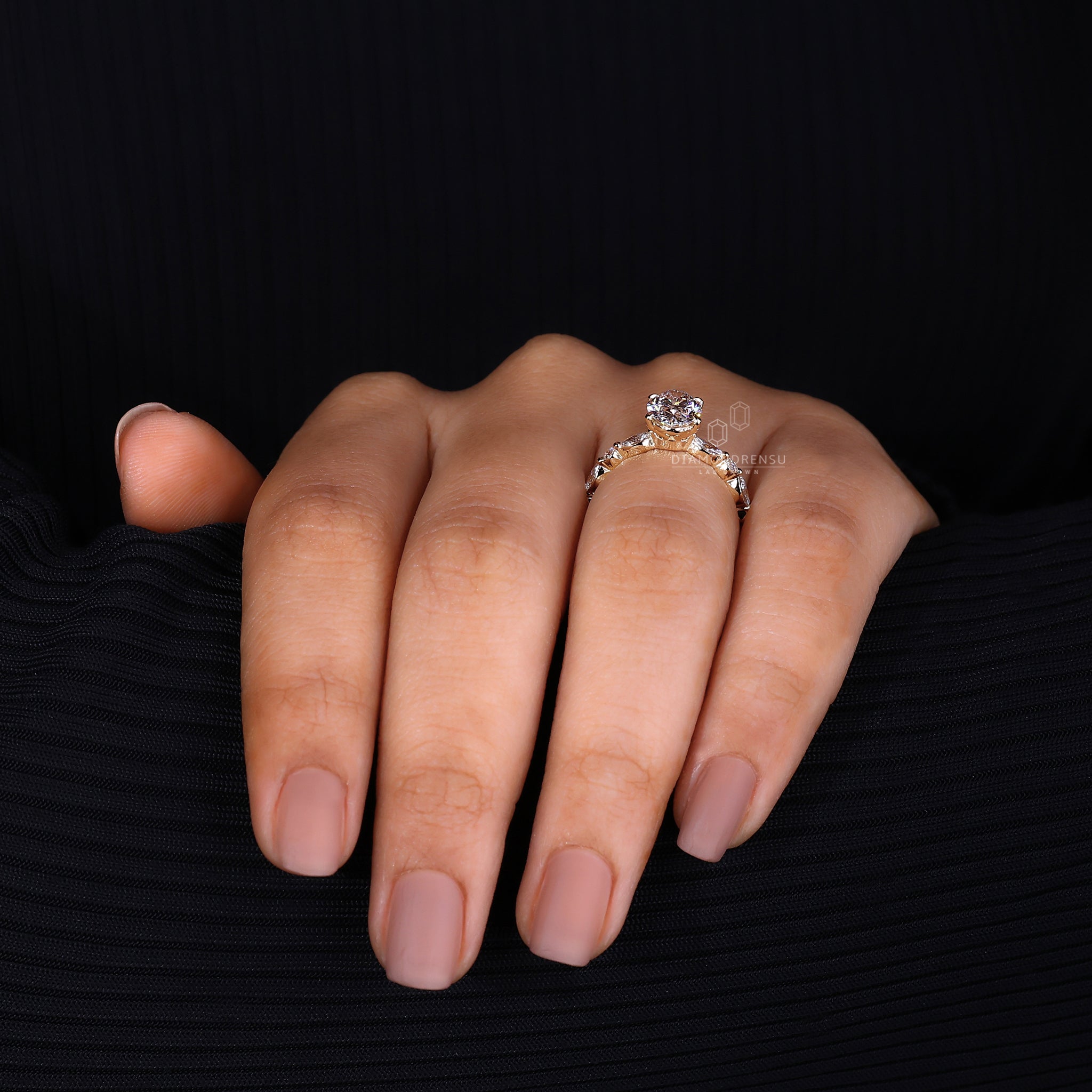 Marquise side diamond ring
