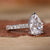 Elegant pear shaped diamond ring set in a timeless design.