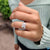 Rose cut moissanite Toi et Moi ring with prong setting.
