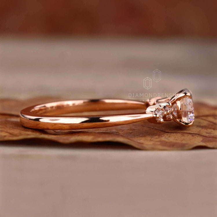 Round brilliant cut diamond set in a 5 stone diamond ring, perfect for an engagement ring for women.
