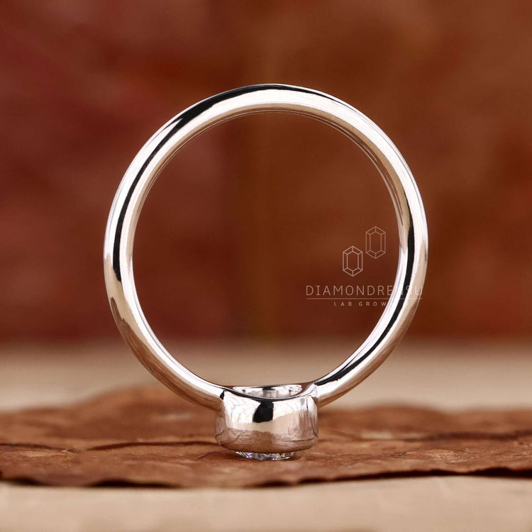 Bezel set diamond ring white gold for a classic appeal.