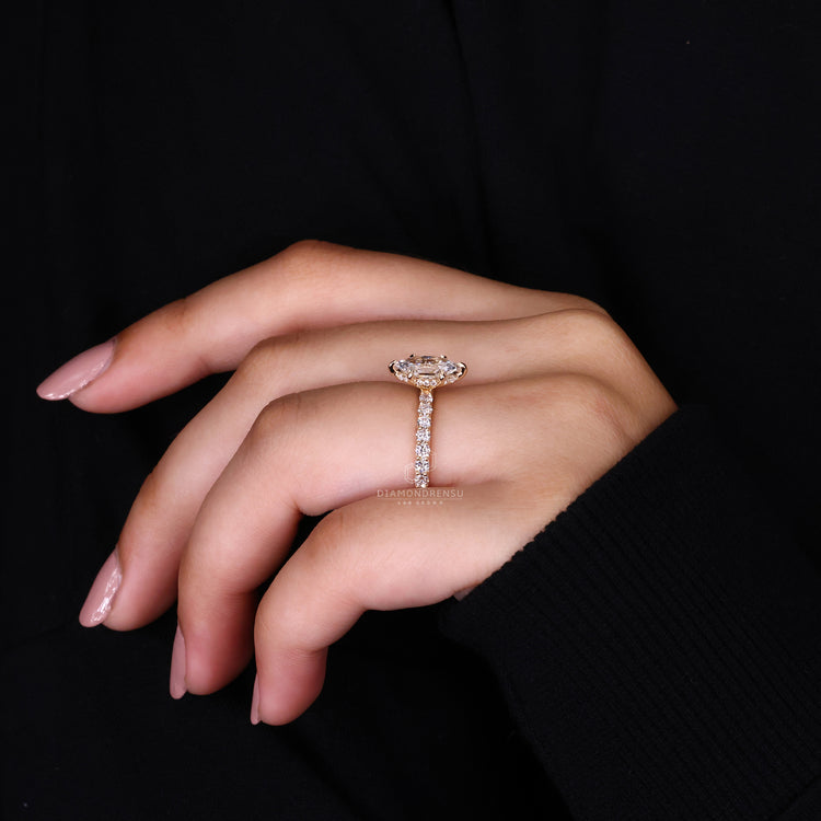 Pave setting ring holds diamonds in claw prong setting.
