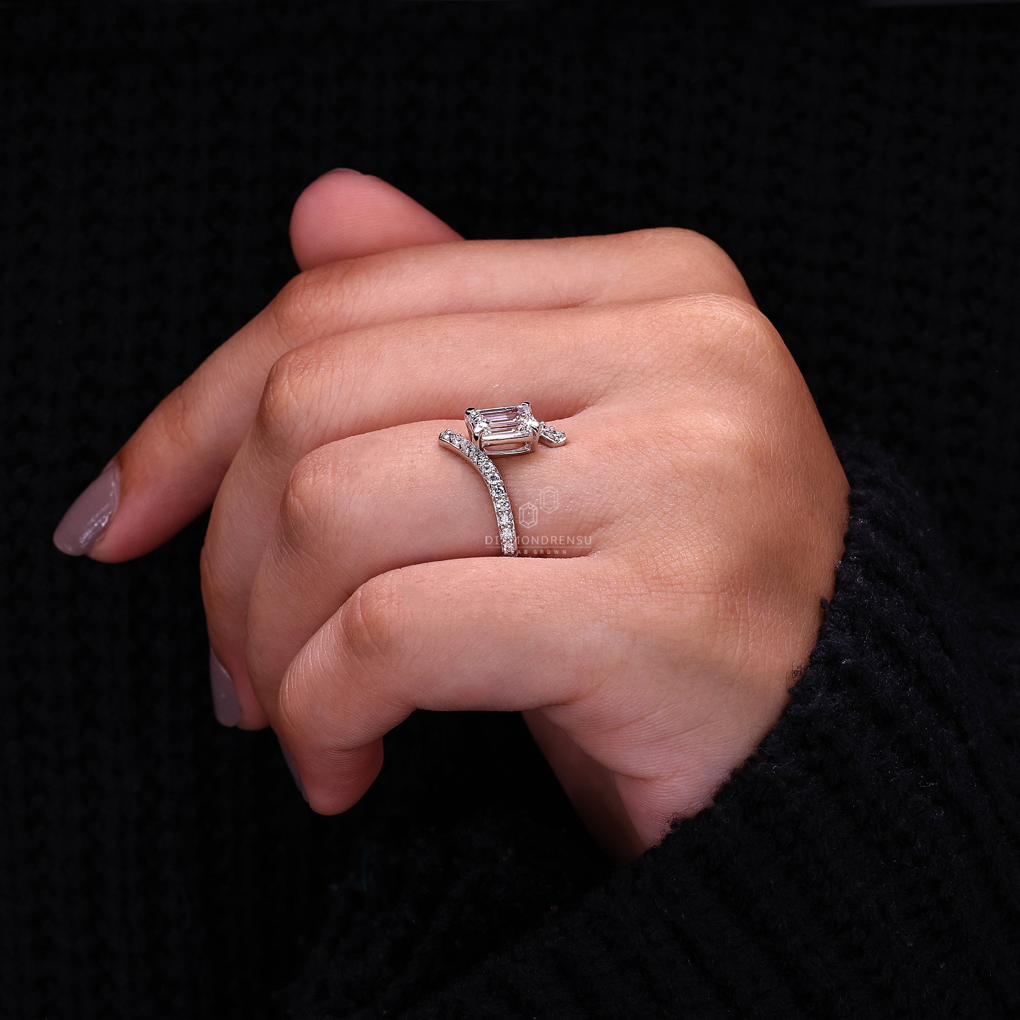 Diamondrensu UK engagement ring with white gold band and pave diamonds.
