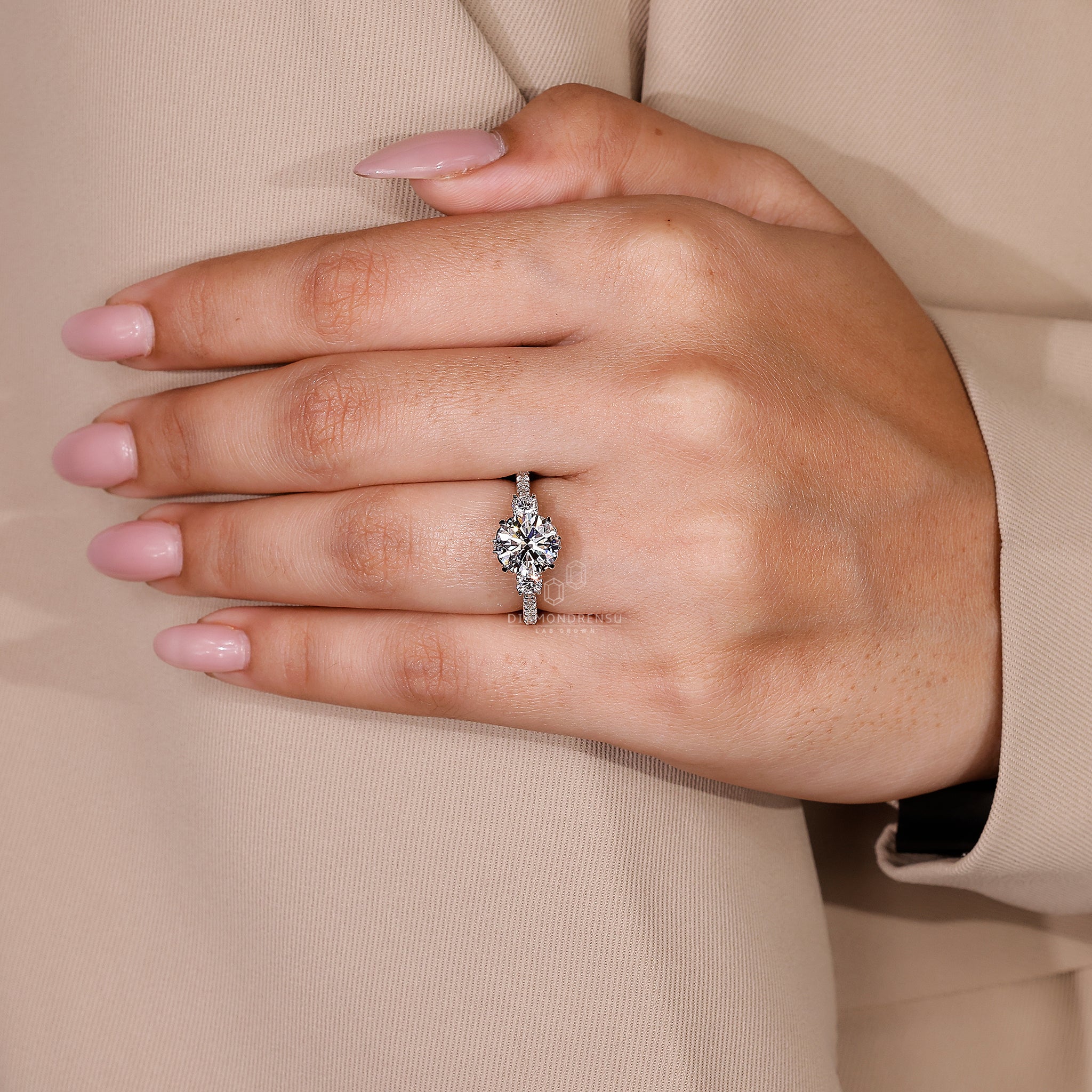 White gold ring with three stone ring
