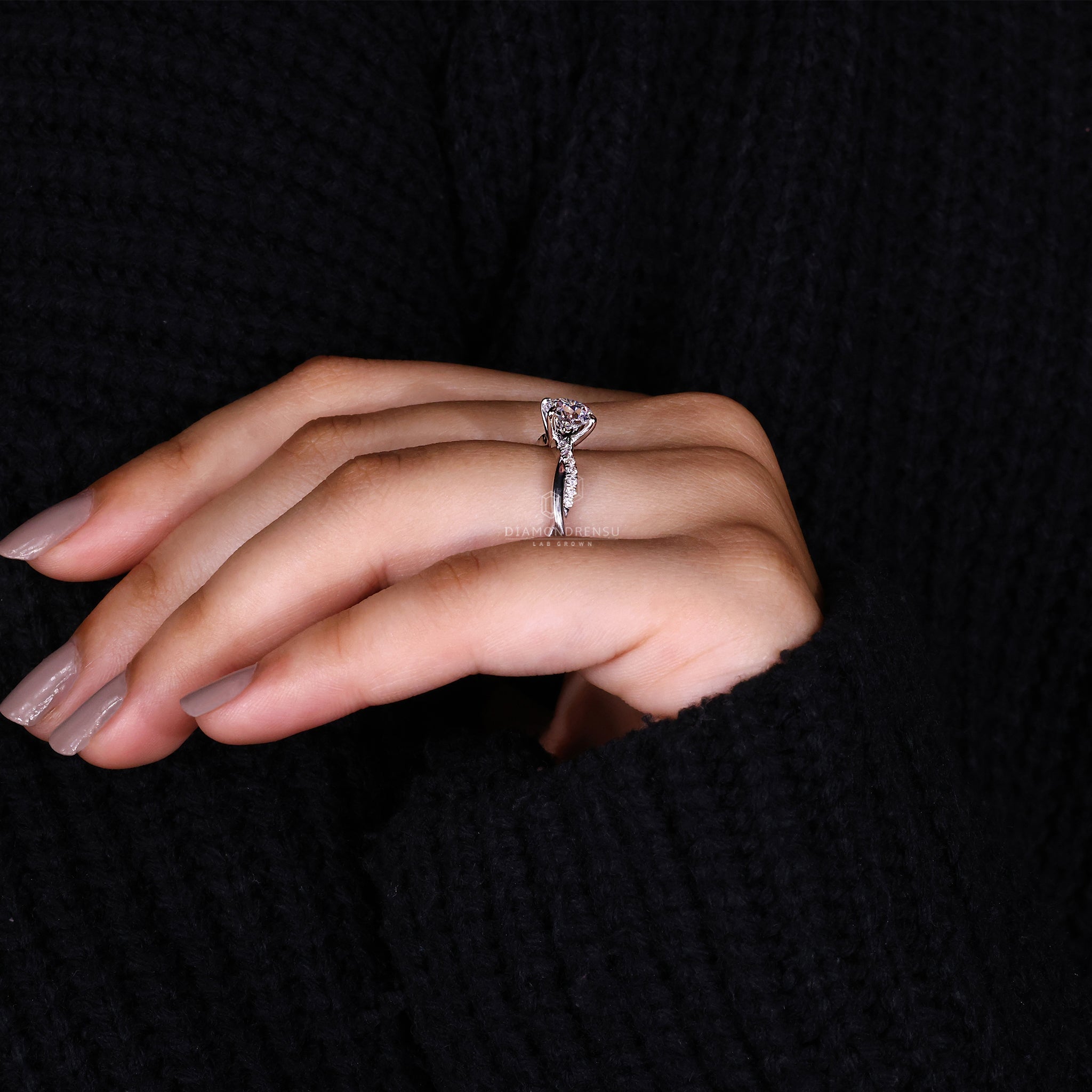 Round Diamond Engagement Ring on Model's Finger