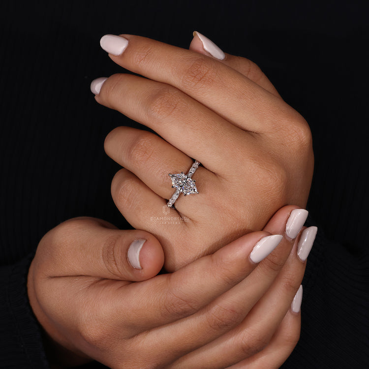White gold ring paired with Dutch marquise diamond ring.
