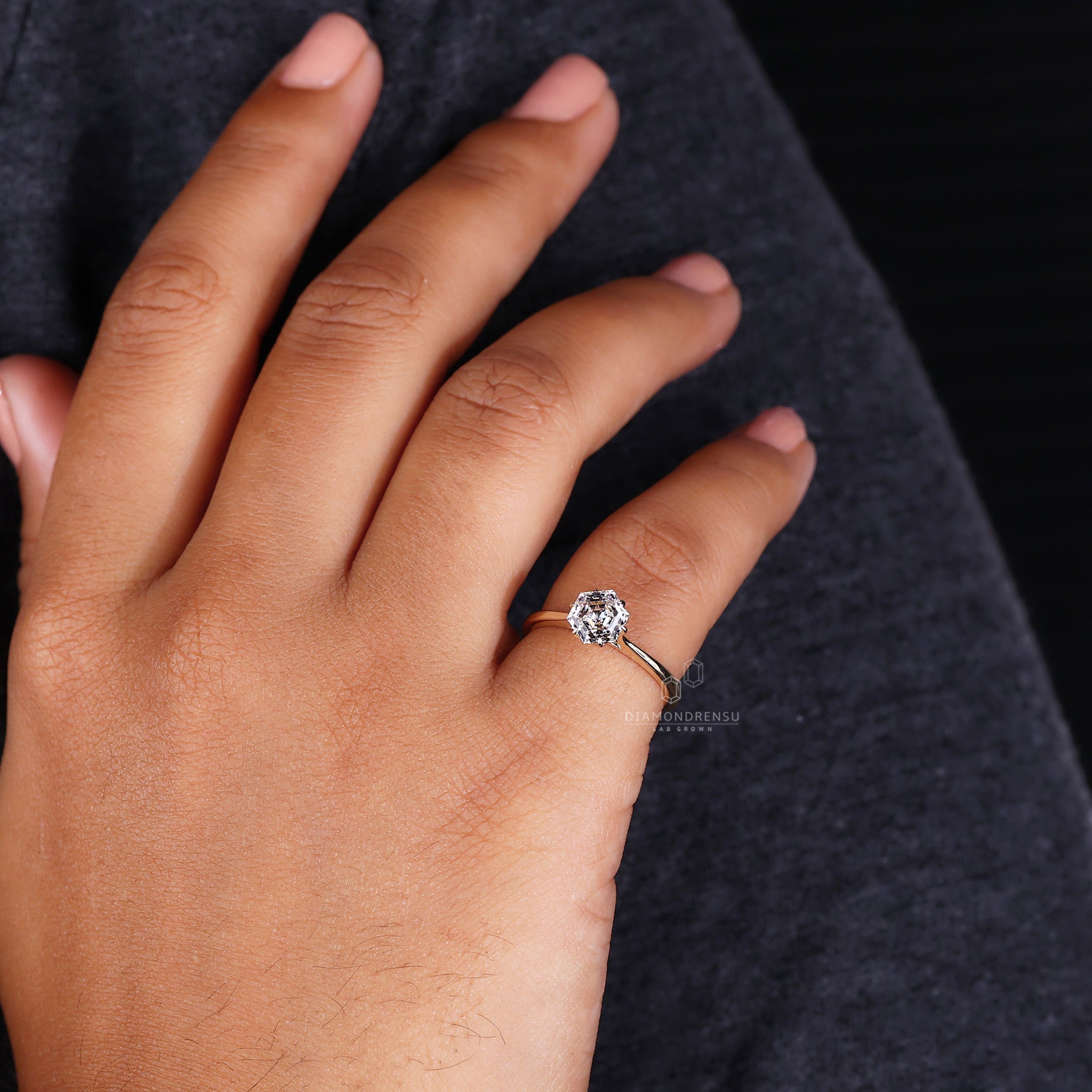 Lab grown diamond solitaire ring with tapered ring shank.
