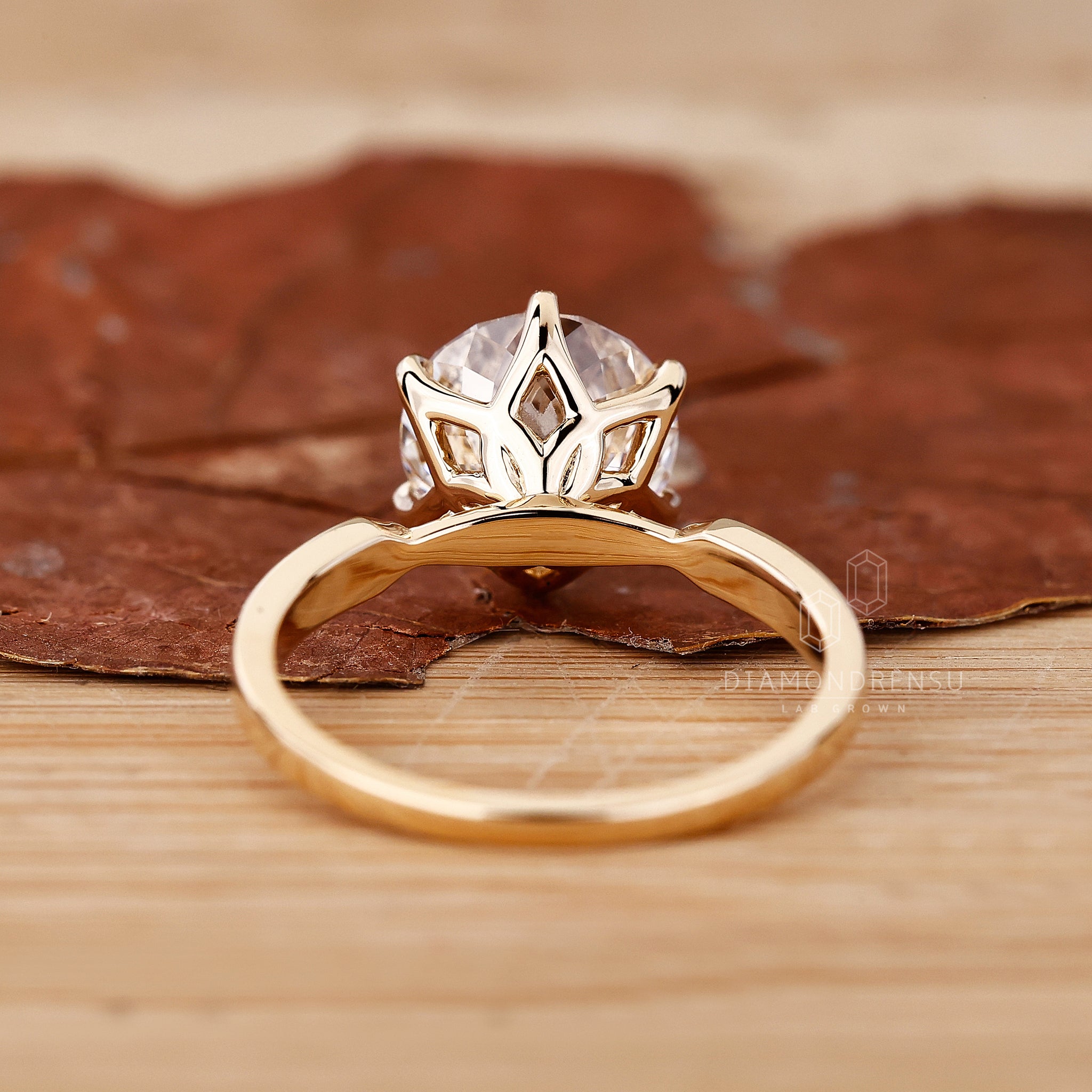 Handmade jewelry with a pinched shank design.
