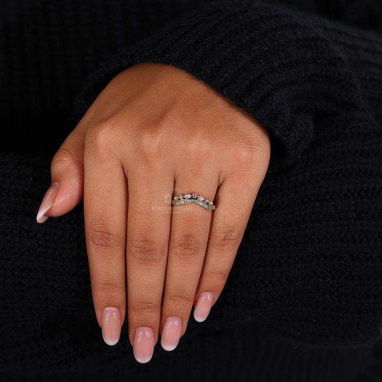 Handmade emerald and diamond wedding ring.
