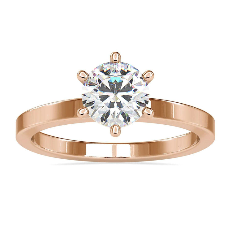 6 prong engagement ring with round diamond in white gold.
