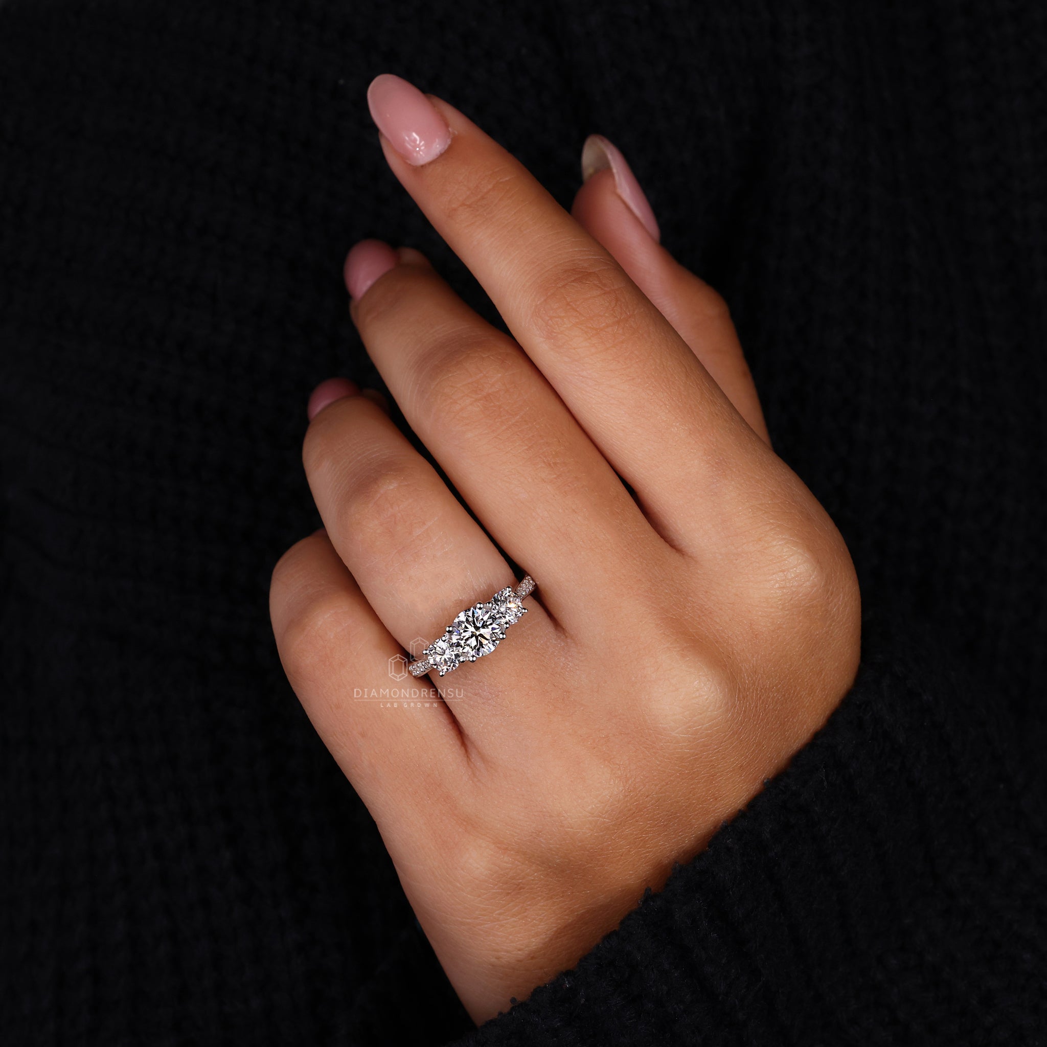 Lab diamond ring with tapered pave and round diamond pave set accents.

