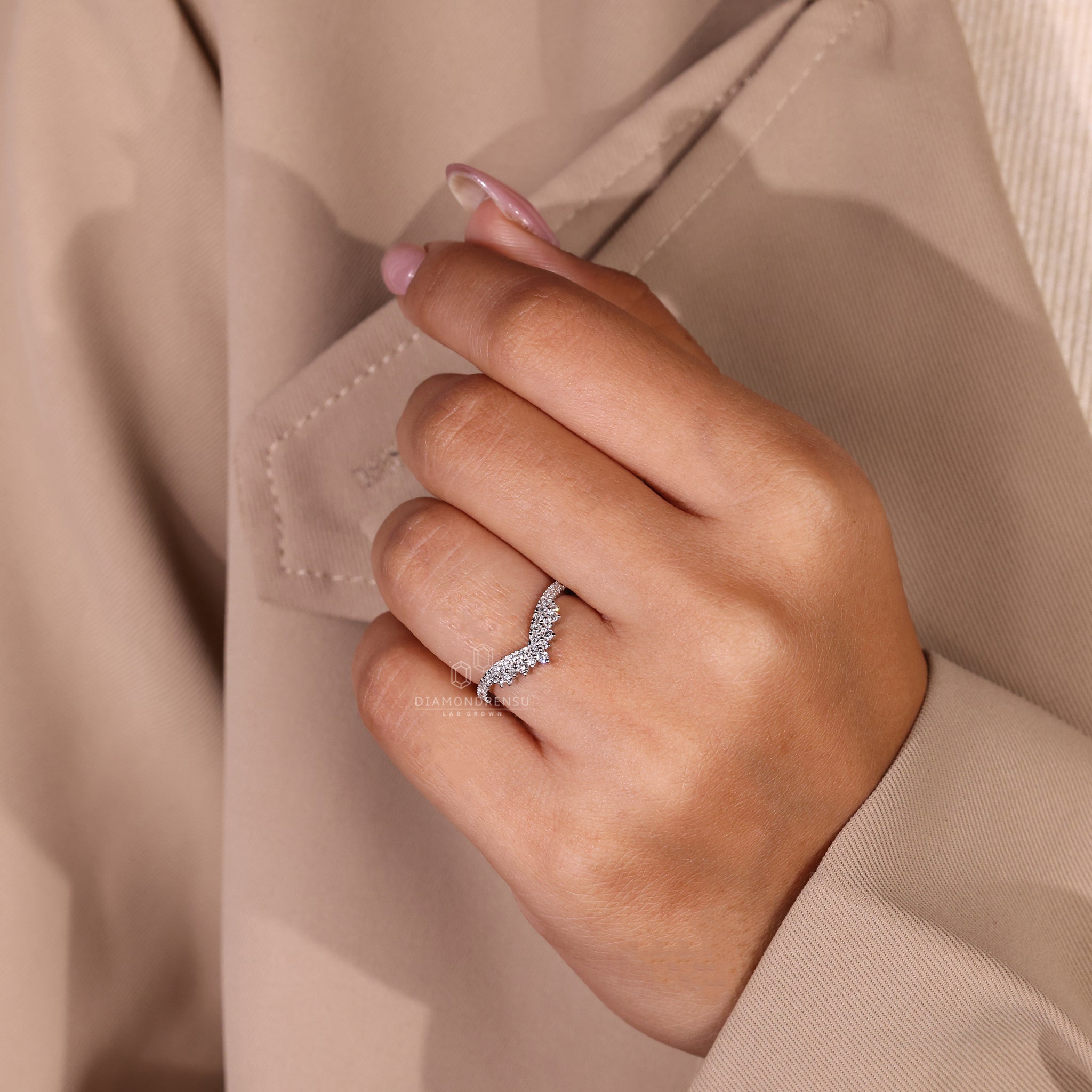White gold tiara-style wedding ring.
