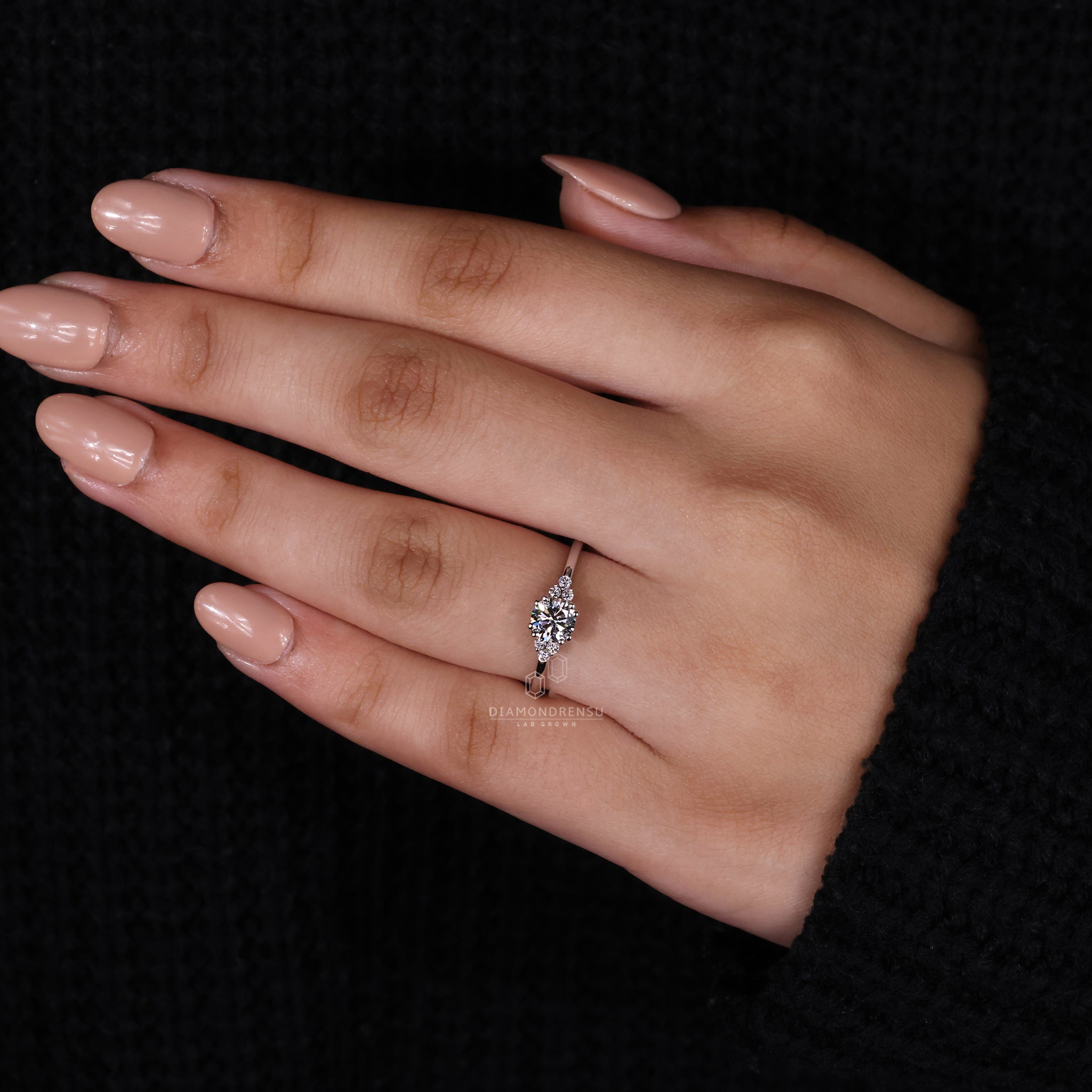 White gold ring featuring round diamond in muse setting for proposal ring.

