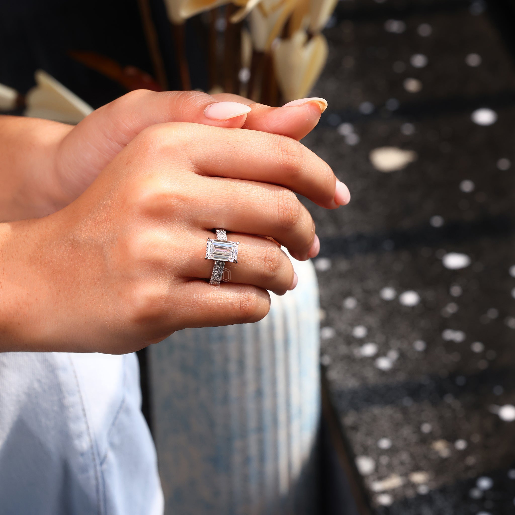 White and rose gold ring with prong setting and V shaped prong ring.
