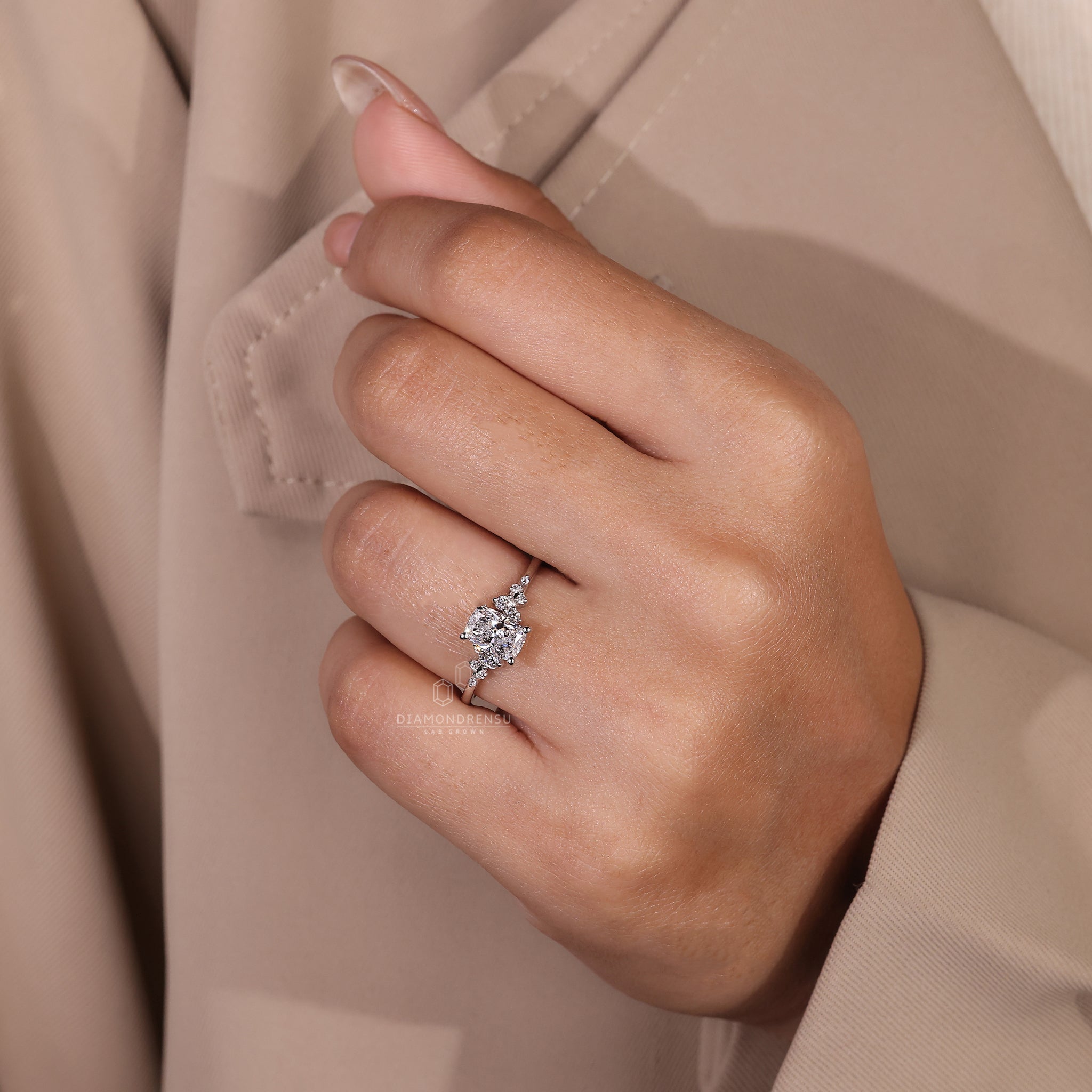 IGI certified engagement ring with round side stone layout.
