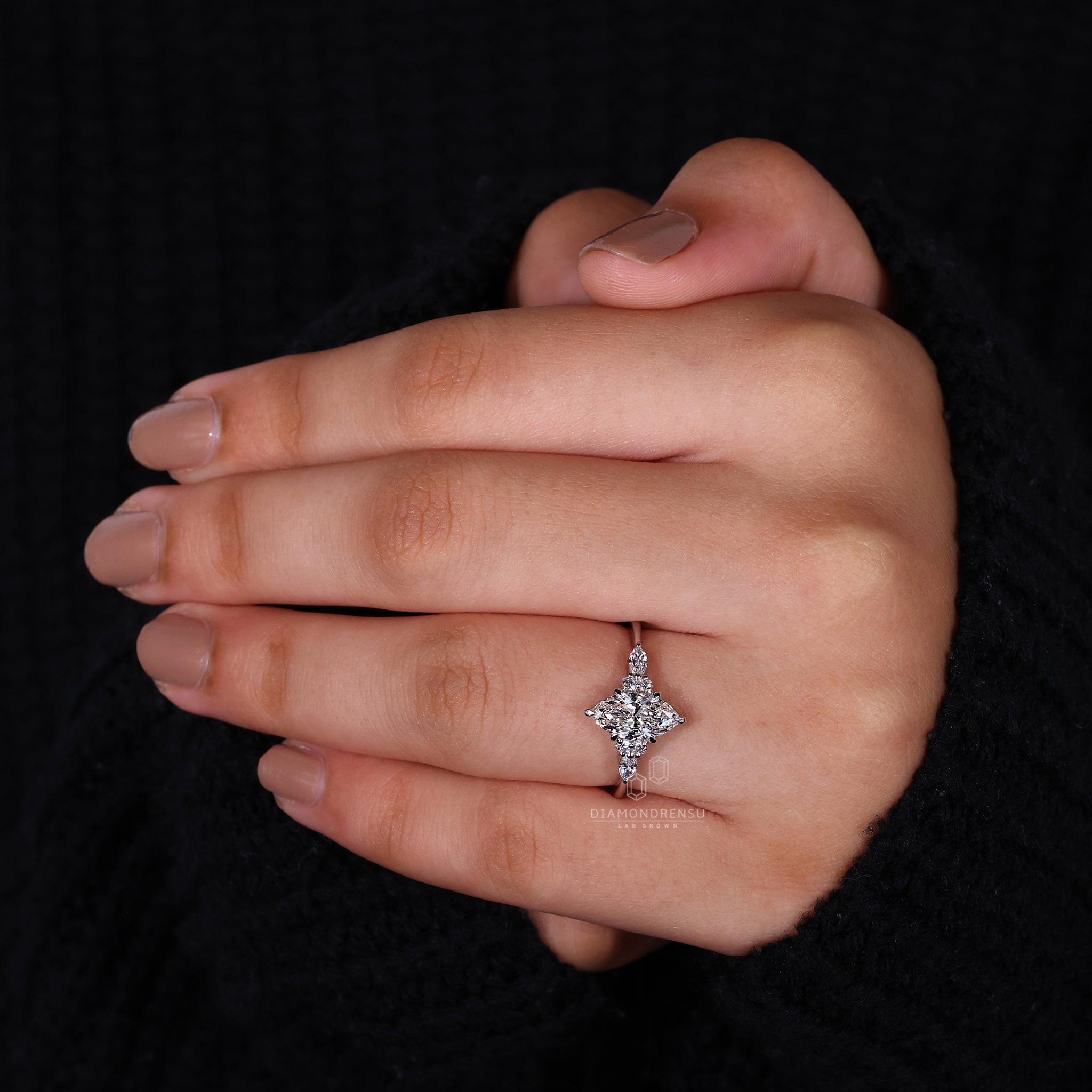 Custom engagement ring designed with 6 claw prong setting.
