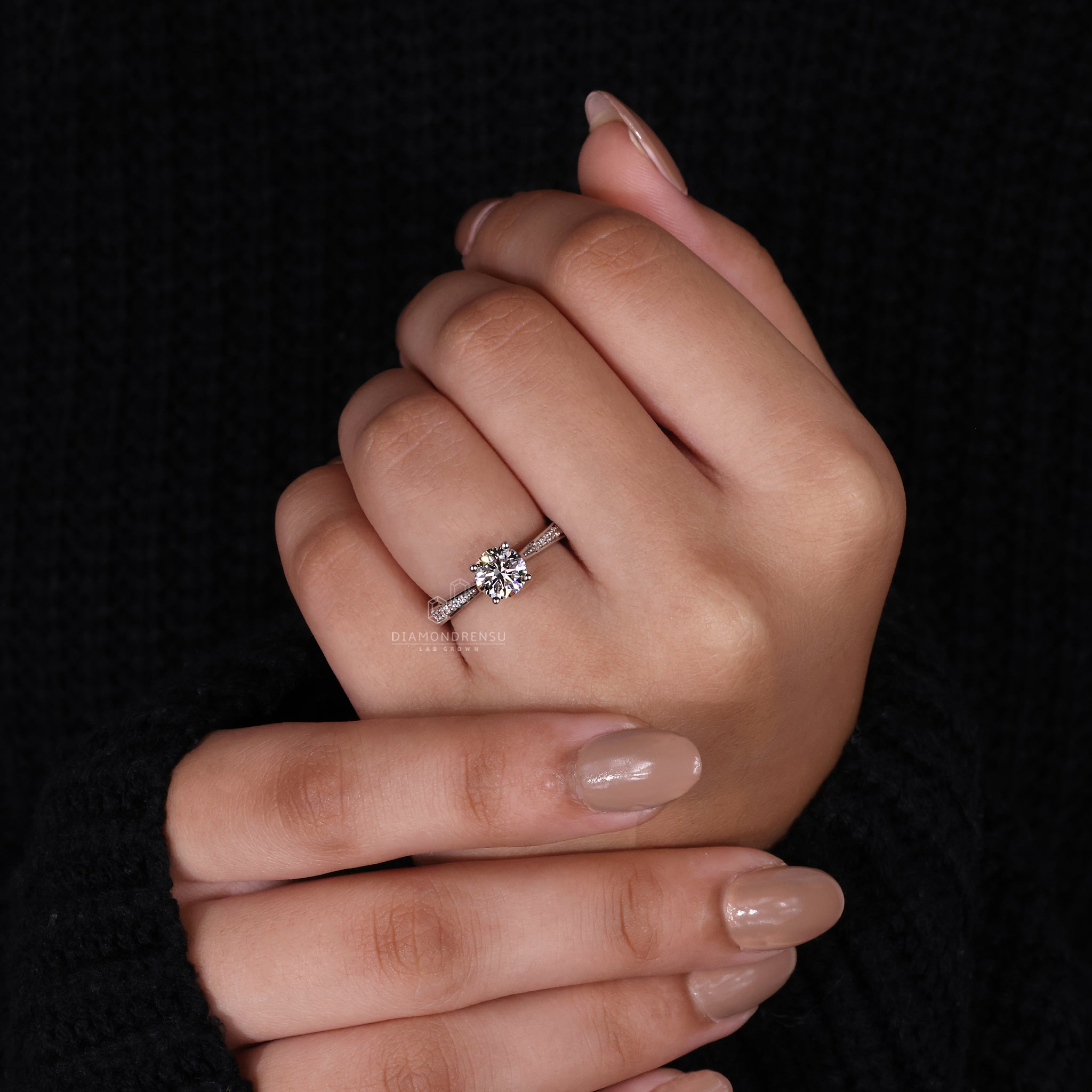 Buy engagement ring featuring Tapered Pave Setting.

