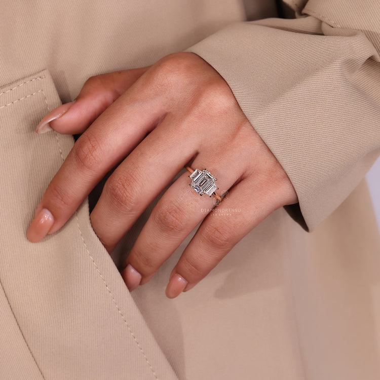 Engage Ring UK shows this three stone style in yellow gold.
