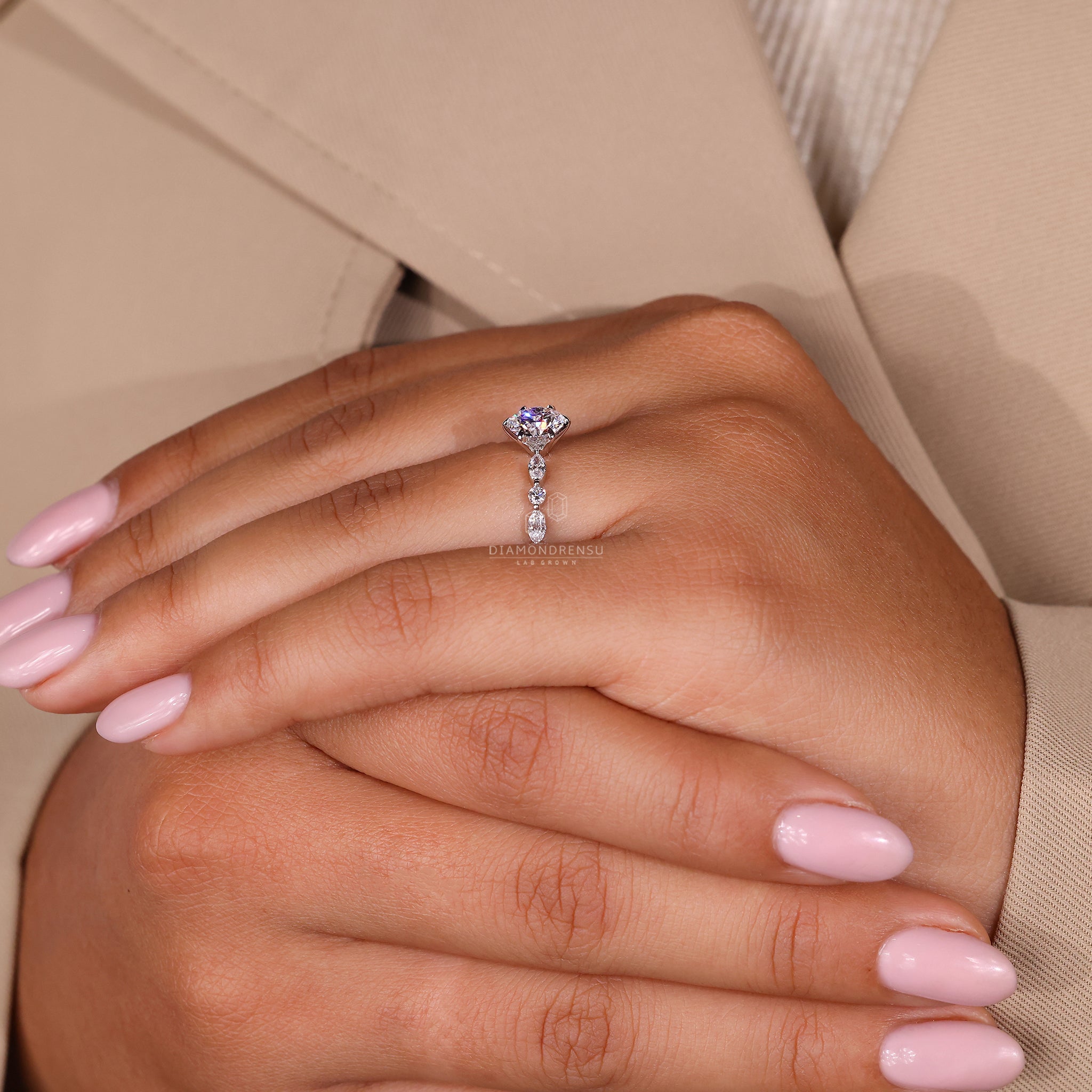 Diamondrensu UK engagement ring with shared prong and handmade jewellery finish.
