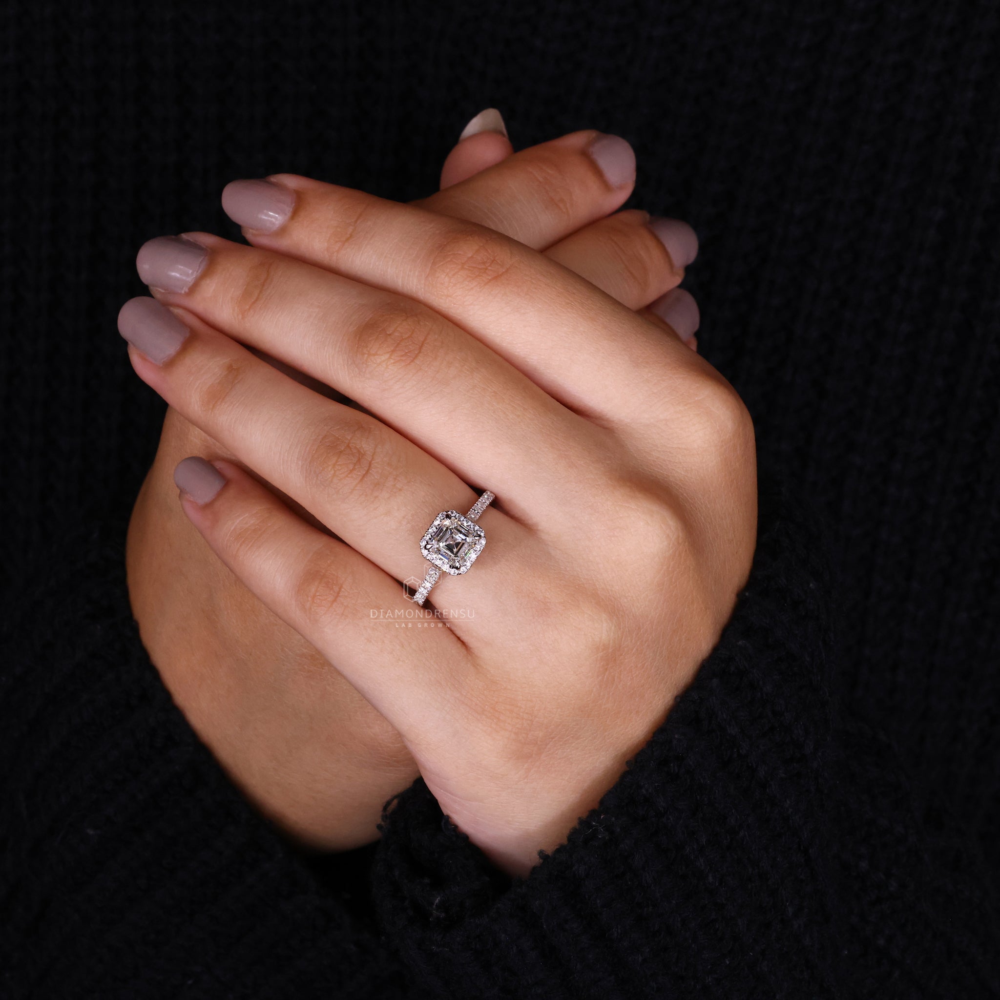 Handmade jewelry featuring an asscher cut diamond and pave diamonds for a diamondrensu UK ring.
