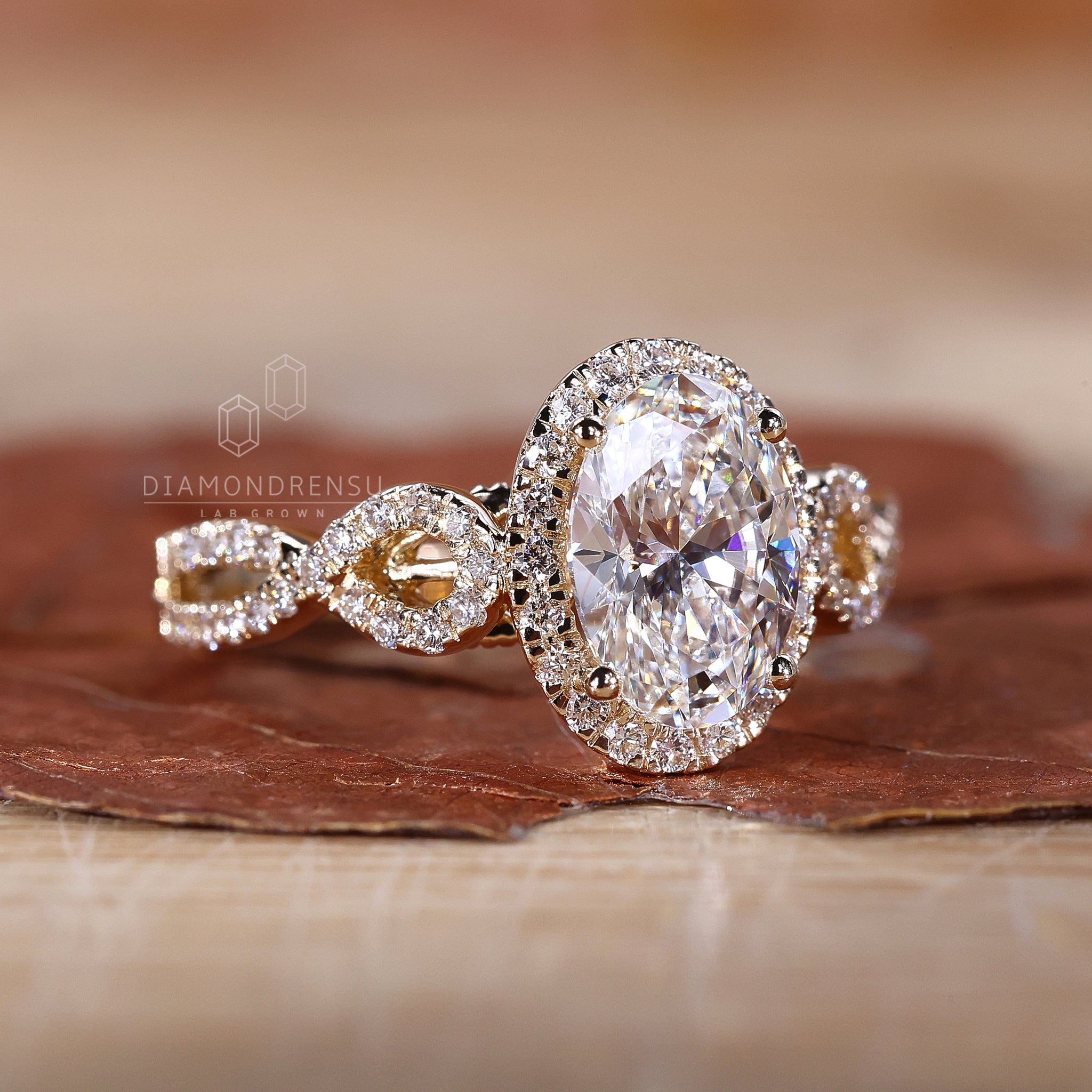 Twisted round cut pave band engagement ring.
