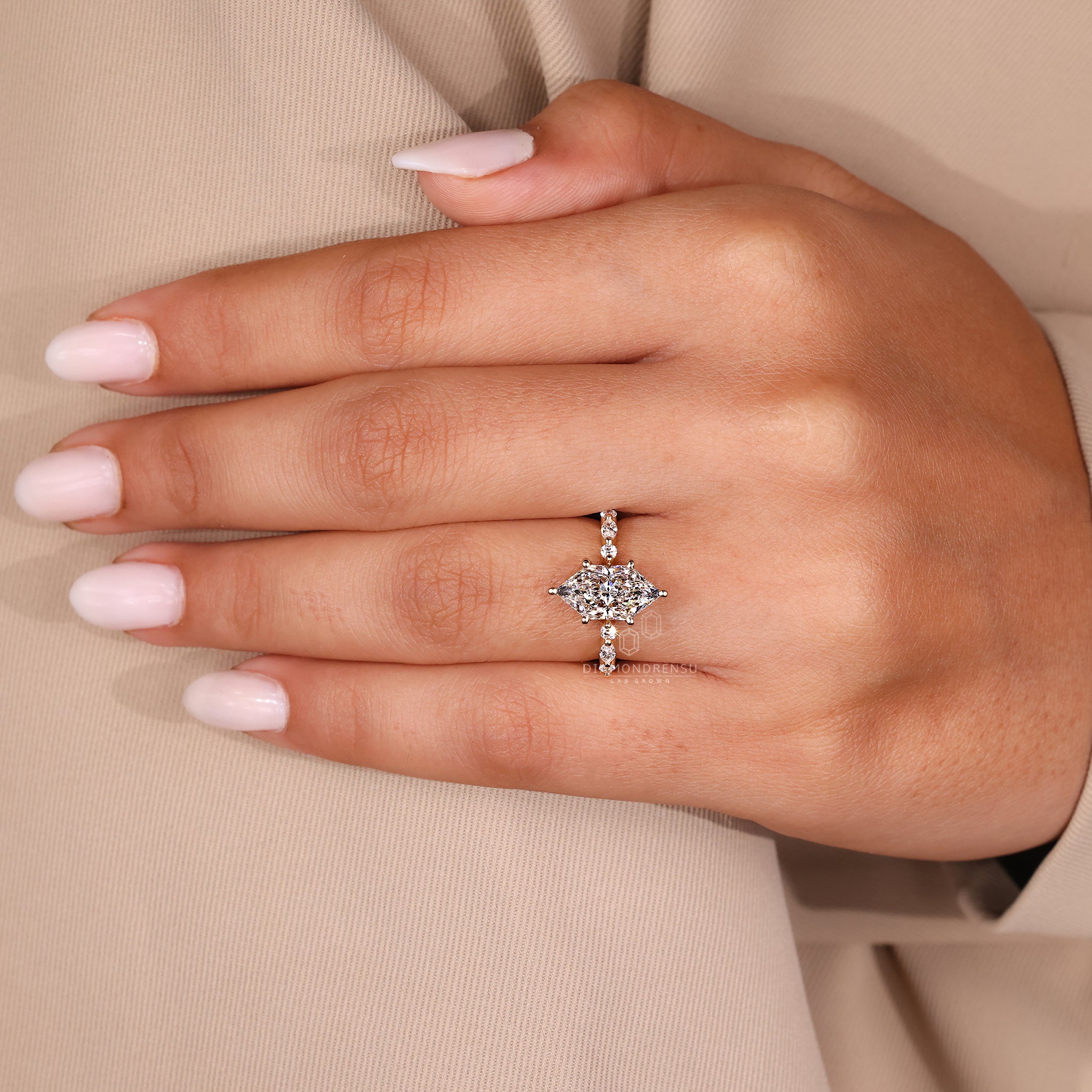 Handmade ring featuring marquise and round mix.
