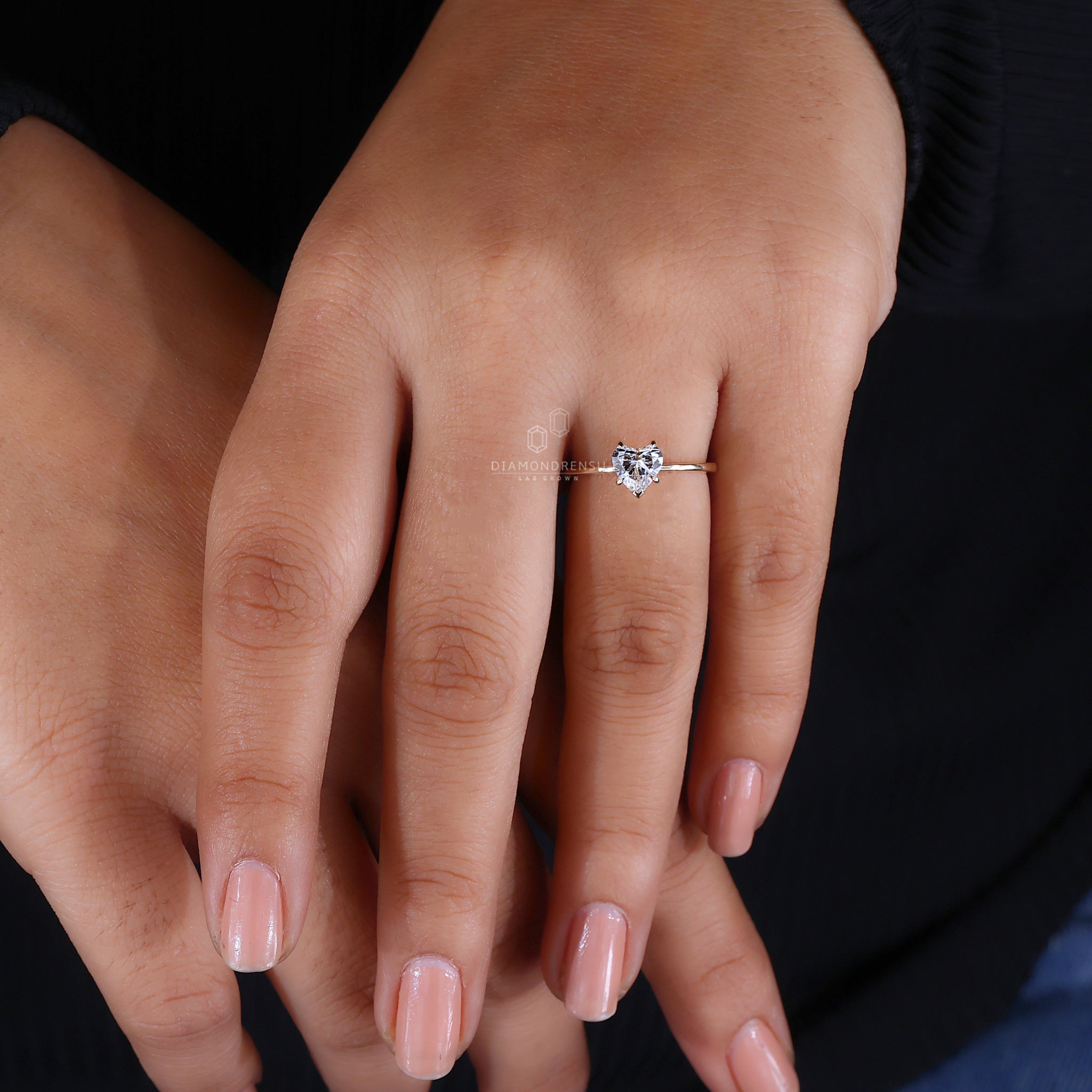 Yellow gold engagement ring heart cut.
