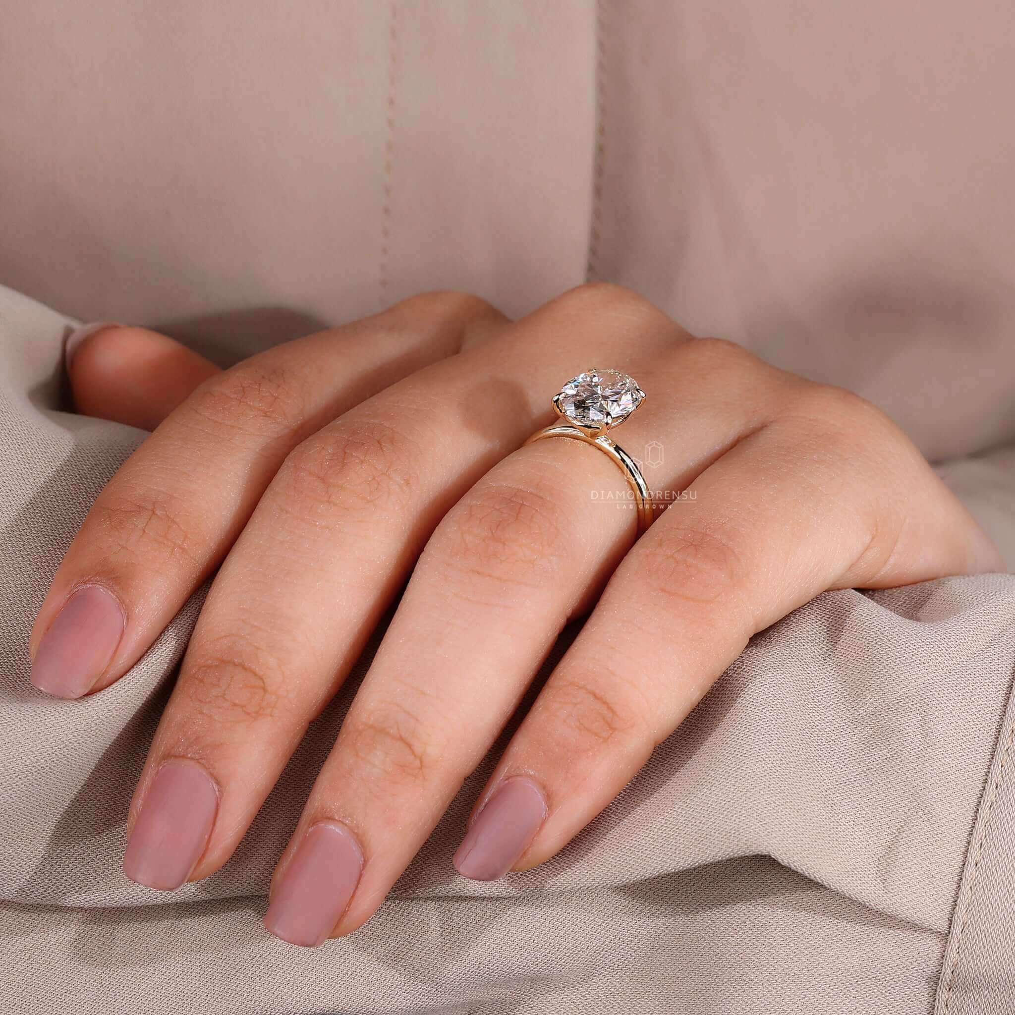 Classic oval solitaire ring with a sparkling diamond centre for everlasting beauty.