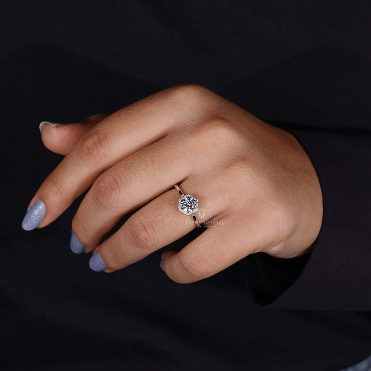 White gold halo engagement ring with delicate craftsmanship.