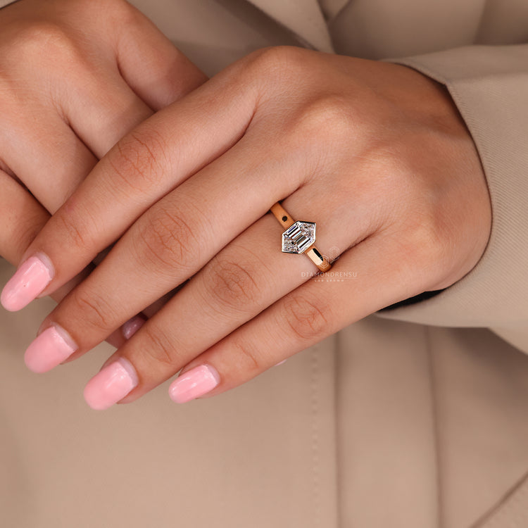 Handmade jewelry with a bezel set solitaire diamond.
