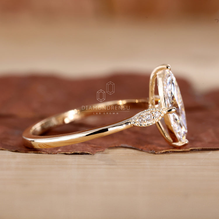 Yellow gold engagement ring marquise design.
